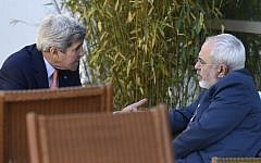 US Secretary of State John Kerry, left, talks with Iranian Foreign Minister Mohammad Javad Zarif, in Geneva, Switzerland, Saturday, May 30, 2015 (AP Photo/Susan Walsh, Pool)