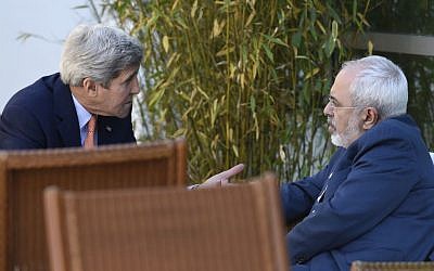 US Secretary of State John Kerry, left, talks with Iranian Foreign Minister Mohammad Javad Zarif, in Geneva, Switzerland, Saturday, May 30, 2015 (AP Photo/Susan Walsh, Pool)