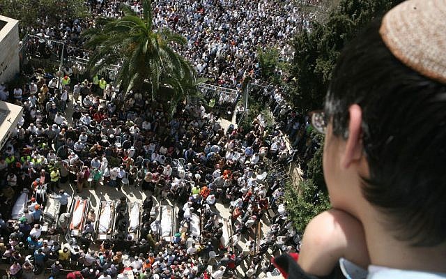 Hundreds of mourners gather at the funeral services for the eight students killed  in a shooting attack on  Mercaz Harav yeshiva in Jerusalem on March 07, 2008. (Photo credit: Nati Shohat/Flash 90)