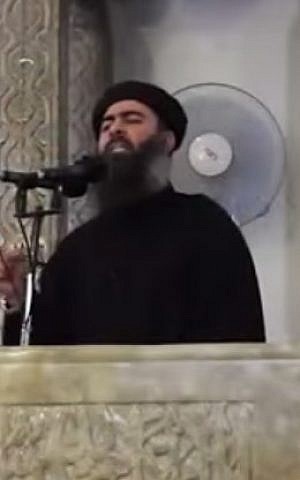 Islamic State leader Abu Bakr al-Baghdadi giving a sermon. (screen capture: YouTube)