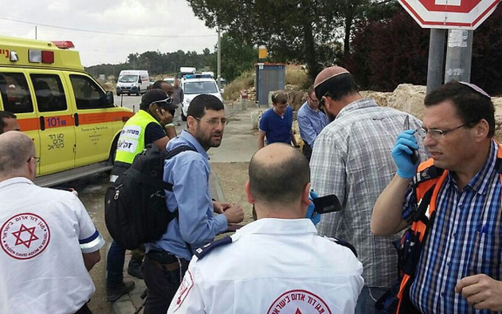 MDA paramedics respond to a suspected terrorist car-ramming attack outside of the West Bank settlement of Alon Shvut on May 14, 2015. (Courtesy Gush Etzion local council) MDA paramedics respond to a suspected terrorist car-ramming attack outside of the West Bank settlement of Alon Shvut on May 14, 2015. (Courtesy Gush Etzion local council)