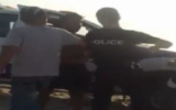 A recently released video shows a police officer striking an 18-year-old in Ashdod. (Screen capture: Channel 10)