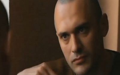 Israeli filmmaker Vladi Antonevicz undercover as a neo-Nazi supporter (Channel 2 News/'Credit for Murder')