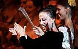 A file picture taken on November 20, 2005 shows Russian ballet dancer Maya Plisetskaya dancing during a performance in her honor on stage at the Kremlin Palace in Moscow (photo credit: AFP/ YURI KADOBNOV)