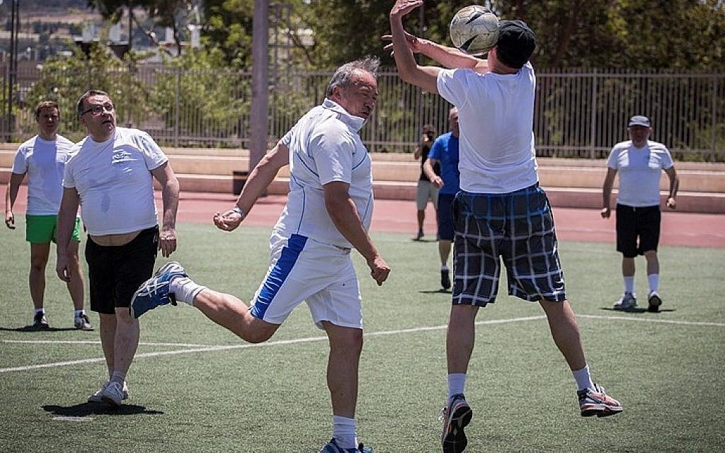 Israeli Beytenu party leader, Avigdor Liberman, and his party members play soccer in Jerusalem against a team of the Russian Jewish Congress members, marking the victory day on Nazi Germany, 70 years ago. May 7, 2015. (Photo credit : Hadas Parush/Flash90)