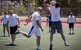 Israeli Beytenu party leader, Avigdor Liberman, and his party members play soccer in Jerusalem against a team of the Russian Jewish Congress members, marking the victory day on Nazi Germany, 70 years ago. May 7, 2015. (Photo credit : Hadas Parush/Flash90)