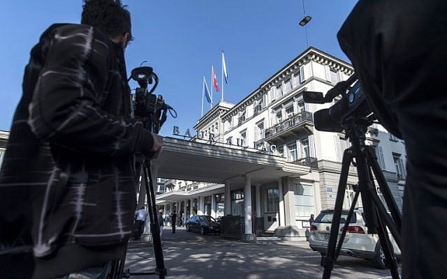 Media gathers outside the Hotel Baur-au-Lac where Swiss authorities conducted an early morning operation on May 27, 2015, to arrest FIFA officials. (AFP PHOTO / STR) Media gathers outside the Hotel Baur-au-Lac where Swiss authorities conducted an early morning operation on May 27, 2015, to arrest FIFA officials. (AFP PHOTO / STR)