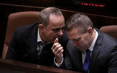 Likud members Gilad Erdan (R) speaking with Yuval Steinitz at the Knesset plenum on Wednesday, May 14 2015, before the swearing-in of the new government. (Photo credit: Isaac Harari/Knesset Spokesperson) Likud lawmakers Gilad Erdan (R) and Yuval Steinitz at the Knesset plenum on Wednesday, May 14 2015, before the swearing-in of the new government. (Isaac Harari/Knesset Spokesperson)
