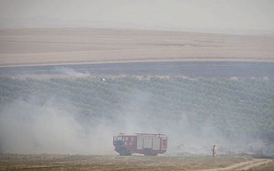 Firefighters seen in southern Israel, May 27, 2015 (Albert Sadikov/Flash90) Firefighters seen in southern Israel, May 27, 2015 (Albert Sadikov/Flash90)