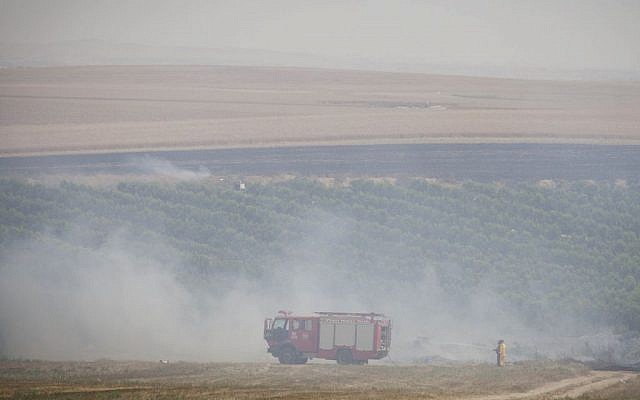 Firefighters seen in southern Israel, May 27, 2015 (Albert Sadikov/Flash90) Firefighters seen in southern Israel, May 27, 2015 (Albert Sadikov/Flash90)