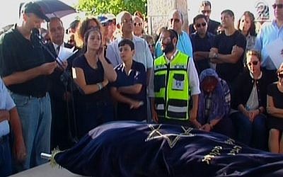 Or Asraf's father Patrick eulogizes his son during his funeral on May 6, 2015. Or was the only Israeli fatality from the 7.8 magnitude Nepalese earthquake. (Screen capture: Channel 2)