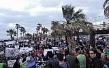 File: At least 1,000 activists and Haifa area residents crowd the Kiryat Haim suburb to protest Health Ministry findings that linked heightened cancer rates in the city with high levels of air pollution, May 3, 2015 (Screen capture: Facebook)