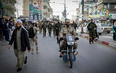 Members of the Palestinian National Security service, loyal to Hamas, patrol the southern Gaza strip border on February 10, 2015. (photo credit: Abed Rahim Khatib/Flash90)