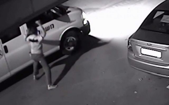 Kheir Hamdan attacks police van with a knife on Nov. 8, 2014. Police Investigations Unit cleared police of wrongdoing Tuesday for fatally shooting Hamdan. (Screen capture) Kheir Hamdan attacks police van with a knife on Nov. 8, 2014. Police Investigations Unit cleared police of wrongdoing Tuesday for fatally shooting Hamdan. (Screen capture)