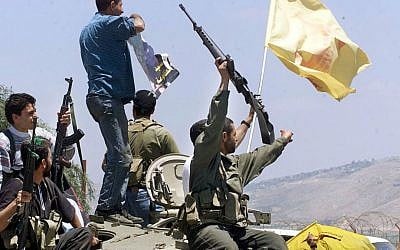 Hezbollah fighters celebrating on the day the IDF left South Lebanon, May 24, 2000. (AP: Enric Marti) Hezbollah fighters celebrating on the day the IDF left South Lebanon, May 24, 2000. (AP: Enric Marti)