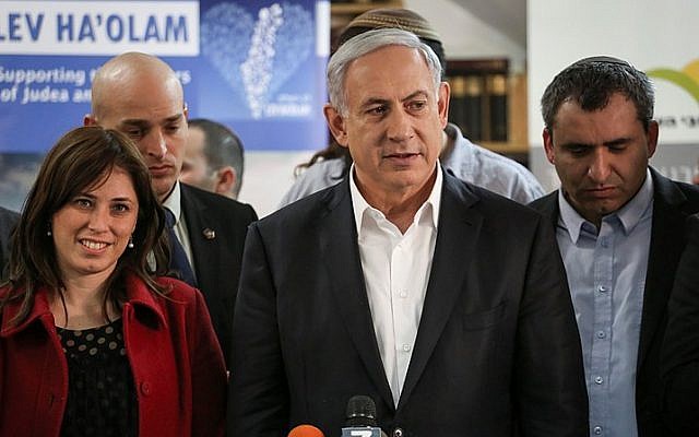 File: Likud member Tzipi Hotovely (L) next to Prime Minister Benjamin Netanyahu and Zeev Elkin (R ), during a tour of the "Lev HaOlam" (Heart of the World) organization, in Jerusalem on February 3, 2015. Hotovely was appointed deputy foreign minister by Netanyahu on Thursday, May 14 2015. Netanyahu did not appoint a foreign minister during the swearing-in of his new government. (Photo credit: Hadas Parush/Flash90)