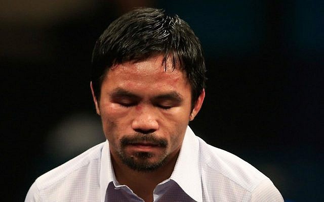 Manny Pacquiao answers questions during a post-fight news conference after losing to Floyd Mayweather, Jr. in their welterweight unification championship bout on May 2, 2015 at MGM Grand Garden Arena in Las Vegas, Nevada. (Jamie Squire/Getty Images/AFP) Manny Pacquiao answers questions during a post-fight news conference after losing to Floyd Mayweather, Jr. in their welterweight unification championship bout on May 2, 2015 at MGM Grand Garden Arena in Las Vegas, Nevada. (Jamie Squire/Getty Images/AFP)