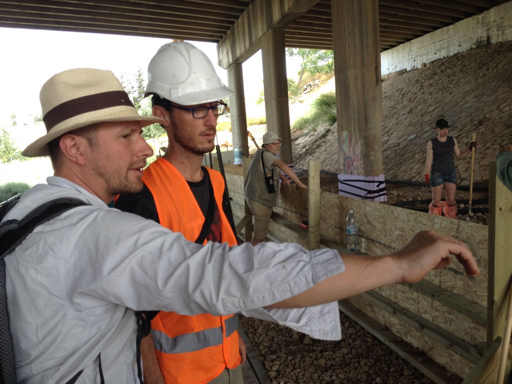 Architect Christophe Barlieb and artist Matan Israeli from Muslala consult at the Meeting Point (Jessica Steinberg/Times of Israel)