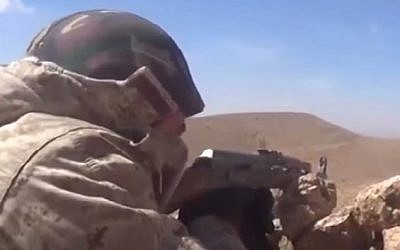 Hezbollah fighters attack Syrian rebels in Qalamoun. (screen capture: YouTube)