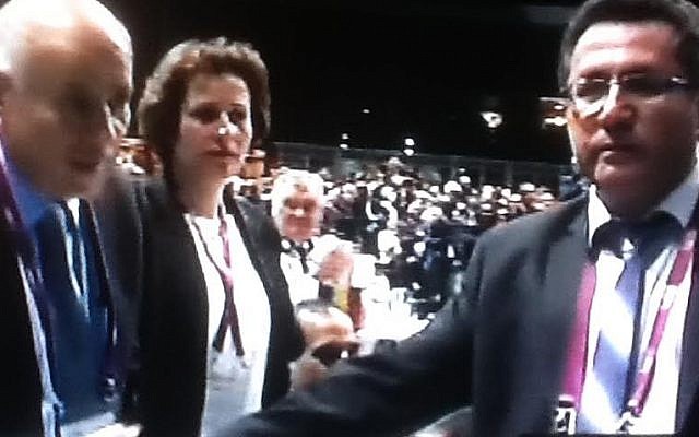Ofer Eini (right), Israel's soccer chief, shakes hands with his Palestinian counterpart Jibril Rajoub at FIFA's Zurich congress, May 29, 2015 (Channel 2 screenshot) Ofer Eini (right), Israel's soccer chief, shakes hands with his Palestinian counterpart Jibril Rajoub at FIFA's Zurich congress, May 29, 2015 (Channel 2 screenshot)