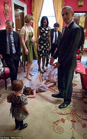Claudia Moser breaks down in front of her family and President Obama at the 2015 White House Seder (Pete Souza/The White House)