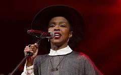 Lauryn Hill performs during the Bringing Human Rights Home concert on February 5, 2014 in Brooklyn, New York. Lauryn Hill image via 
JStone / Shutterstock.com)