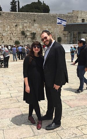 Rabbi Yaakov and Mushkee Raskin at the Western Wall on visit to Israel, May 2015. (Courtesy)