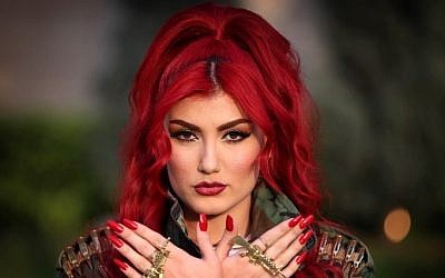Iraqi Kurdish singer Helly Luv poses for a picture during an interview with AFP in Erbil, the capital of the autonomous Kurdish region of northern Iraq, on June 9, 2015. (AFP/Safin Hamed)