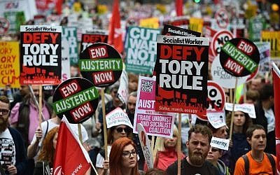 Demonstrators march to protest against the British government's spending cuts and austerity measures in London on June 20, 2015 (AFP PHOTO / BEN STANSALL)