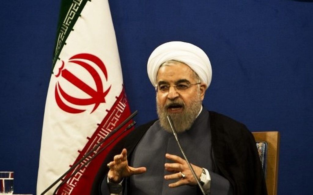 Iranian President Hassan Rouhani speaks during a press conference in Tehran on June 13, 2015. (AFP/Behrouz Mehri)