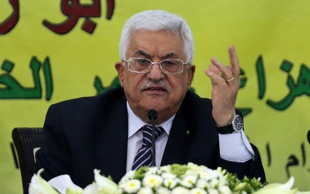 Palestinian Authority President Mahmoud Abbas gestures during a meeting with the Revolutionary Council of his ruling Fatah party, in the West Bank city of Ramallah, June 16, 2015. (AFP/Abbas Momani)