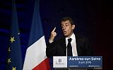 Nicolas Sarkozy, former French president and leader of France's  Republican Party speaks during a meeting on June 3, 2015. (AFP Photo/Lionel Bonaventure)