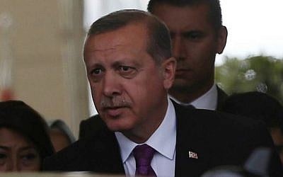 Turkish President Tayyip Erdogan looks on after arriving at Esenboga Airport, in Ankara, on June 8, 2015 after Erdogan's ruling party lost its absolute majority in parliament for the first time since coming to power in 2002. (AFP/ADEM ALTAN)