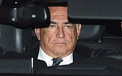 Former International Monetary Fund chief Dominique Strauss-Kahn after leaving the courthouse in Lille, France, February 2, 2015. (AFP/Denis Charlet)