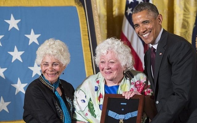 US President Barack Obama presents the Medal of Honor to Elsie Shemin-Roth center, and Ina Bass left, accepting on behalf of their late father, Army Sergeant William Shemin, for actions while serving in France during World War I, during a ceremony in the East Room of the White House in Washington, DC, June 2, 2015. (AFP/SAUL LOEB) US President Barack Obama presents the Medal of Honor to Elsie Shemin-Roth center, and Ina Bass left, accepting on behalf of their late father, Army Sergeant William Shemin, for actions while serving in France during World War I, during a ceremony in the East Room of the White House in Washington, DC, June 2, 2015. (AFP/SAUL LOEB)