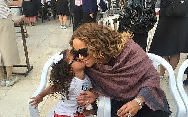 Mariah Carey gets a kiss at the Kotel during a visit to Jerusalem on June 29, 2015. (Maria Carey, Instagram) Mariah Carey gets a kiss at the Kotel during a visit to Jerusalem on June 29, 2015. (Maria Carey, Instagram)