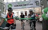Robert Desmond (left) at the finish line of the 'Ride for the Living' in June 2014. (Courtesy)