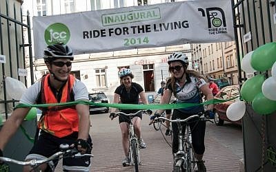 Robert Desmond (left) at the finish line of the 'Ride for the Living' in June 2014. (Courtesy)
