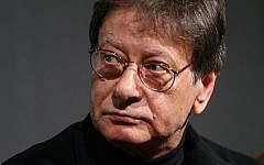 Palestinian poet Mahmoud Darwish seen during a signing for his new book in Amman, Jordan, February 23, 2008 (AP/Nader Daoud)