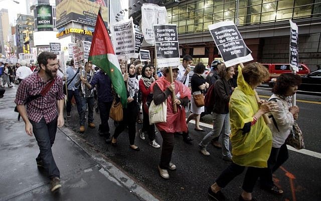 Palestinian and Jewish groups supporting the Palestinian cause walk from Times Square to the United Nations Building during a rally, Thursday, Sept. 15, 2011, in New York (AP/David Karp)