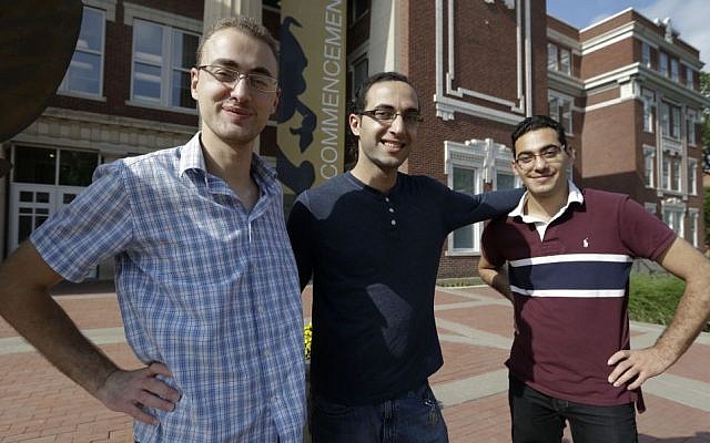 Syrian brothers Mohammad Kayali, left, Ebrahim Kayali, right and Molham Kayali, center, pose for a photograph on the Emporia State University campus in Emporia, Kansas, Wednesday, May 6, 2015 (AP Photo/Orlin Wagner) Syrian brothers Mohammad Kayali, left, Ebrahim Kayali, right and Molham Kayali, center, pose for a photograph on the Emporia State University campus in Emporia, Kansas, Wednesday, May 6, 2015 (AP Photo/Orlin Wagner)