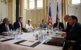 From left, US Secretary of Energy Ernest Moniz, US Secretary of State John Kerry and US Under Secretary for Political Affairs Wendy Sherman meet with Iranian Foreign Minister Mohammad Javad Zarif, second from right, at a hotel in Vienna, Austria, Saturday, June 27, 2015. (Carlos Barria/Pool via AP)