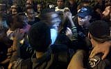 Protesters clashing with police in Tel Aviv on June 3, 2015. (Judah Ari Gross/Times of Israel)