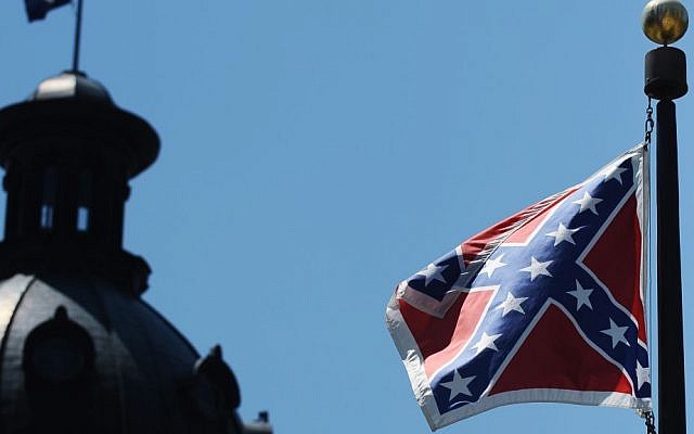 The Confederate flag flies near the South Carolina Statehouse, Friday, June 19, 2015, in Columbia, South Carolina (AP Photo/Rainier Ehrhardt) The Confederate flag flies near the South Carolina Statehouse, Friday, June 19, 2015, in Columbia, South Carolina (AP Photo/Rainier Ehrhardt)