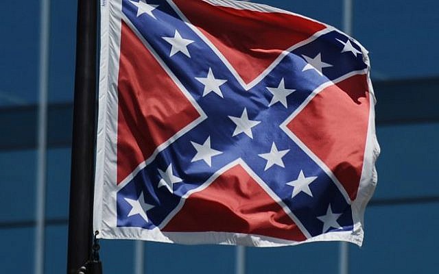 The Confederate flag flies near the South Carolina Statehouse, Friday, June 19, 2015, in Columbia, South Carolina (AP Photo/Rainier Ehrhardt) The Confederate flag flies near the South Carolina Statehouse, Friday, June 19, 2015, in Columbia, South Carolina (AP Photo/Rainier Ehrhardt)