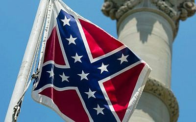 A Confederate flag flies next to the Alabama Confederate Memorial on the grounds of the Alabama Capitol building in Montgomery, Ala., Monday, June 22, 2015. (Albert Cesare/The Montgomery Advertiser via AP) A Confederate flag flies next to the Alabama Confederate Memorial on the grounds of the Alabama Capitol building in Montgomery, Ala., Monday, June 22, 2015. (Albert Cesare/The Montgomery Advertiser via AP)