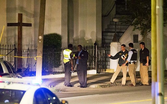 Police stand outside the Emanuel AME Church following a shooting on June 17, 2015, in Charleston, South Carolina. (David Goldman/AP)