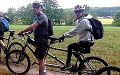 Sighted and visually impaired members of the Israeli CanVelo organization on a tandem bike in the Czech Republic. (photo courtesy of Ken Milman)