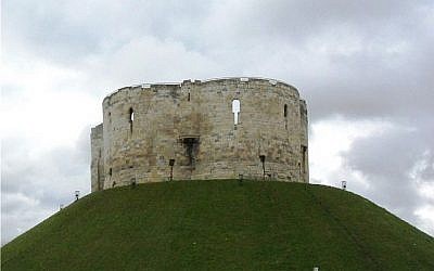 Clifford's Tower in the city of York, a major hub for Jewish economic activity and the site of an early Jewish pogrom in 1190 (Soerfm, CC-BY-SA, via wikipedia)