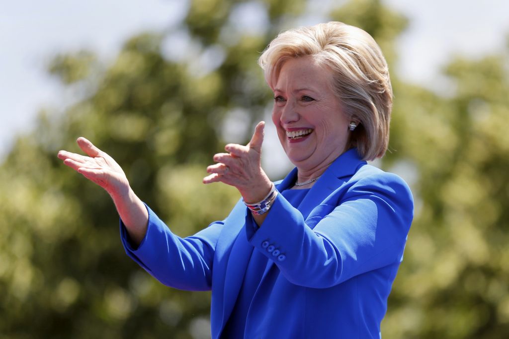 Democratic presidential candidate, former Secretary of State Hillary Rodham Clinton, gestures to supporters as she arrives to speak Saturday, June 13, 2015, on Roosevelt Island in New York. (AP Photo/Julio Cortez) Democratic presidential candidate, former Secretary of State Hillary Rodham Clinton, gestures to supporters as she arrives to speak Saturday, June 13, 2015, on Roosevelt Island in New York. (AP Photo/Julio Cortez)